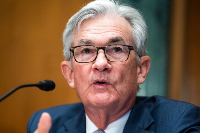 Fed lifts interest rates but signals possible pause amid financial turbulence