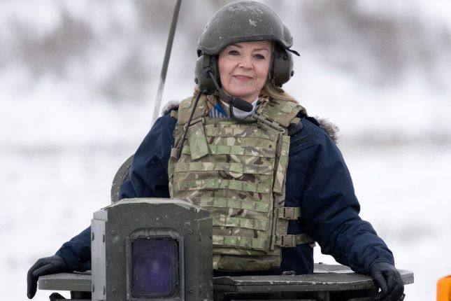 During her visit to Estonia, Britain's Foreign Secretary had a fun time riding a tank along the Russian border.