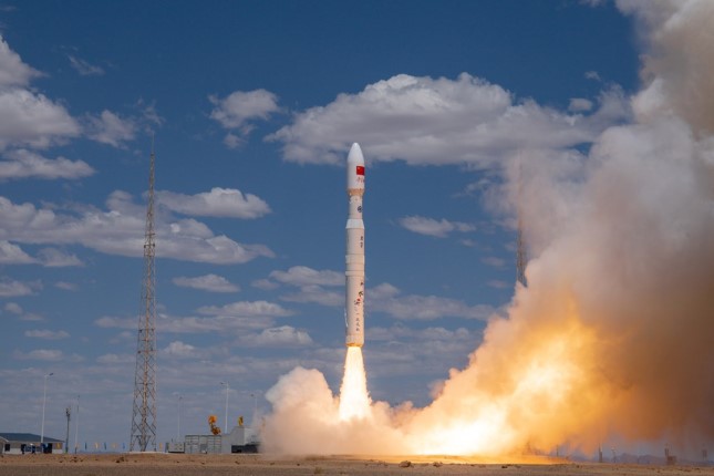 China’s largest solid propellant rocket fires 26 satellites into orbit