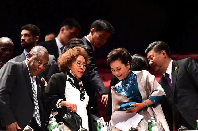 From left: South African President Cyril Ramaphosa and his wife Tshepo Motsepe, Peng Liyuan and her husband Xi Jinping, president of China, at a performance in Johannesburg during a 2018 BRICS meeting. (GovernmentZA/Flickr, CC BY-ND 2.0)